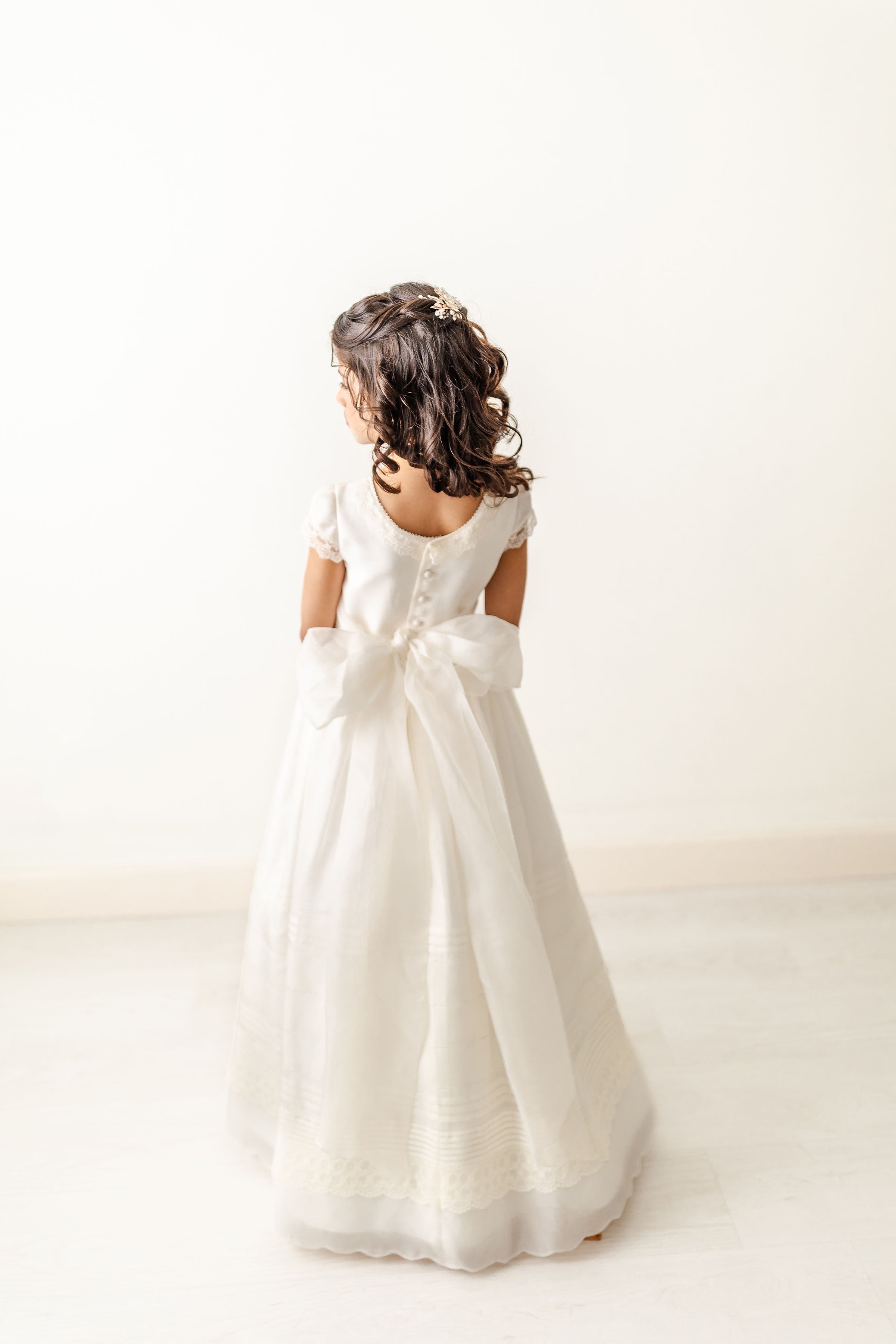 Couture-level detailing on R226 First Communion dress with timeless finish