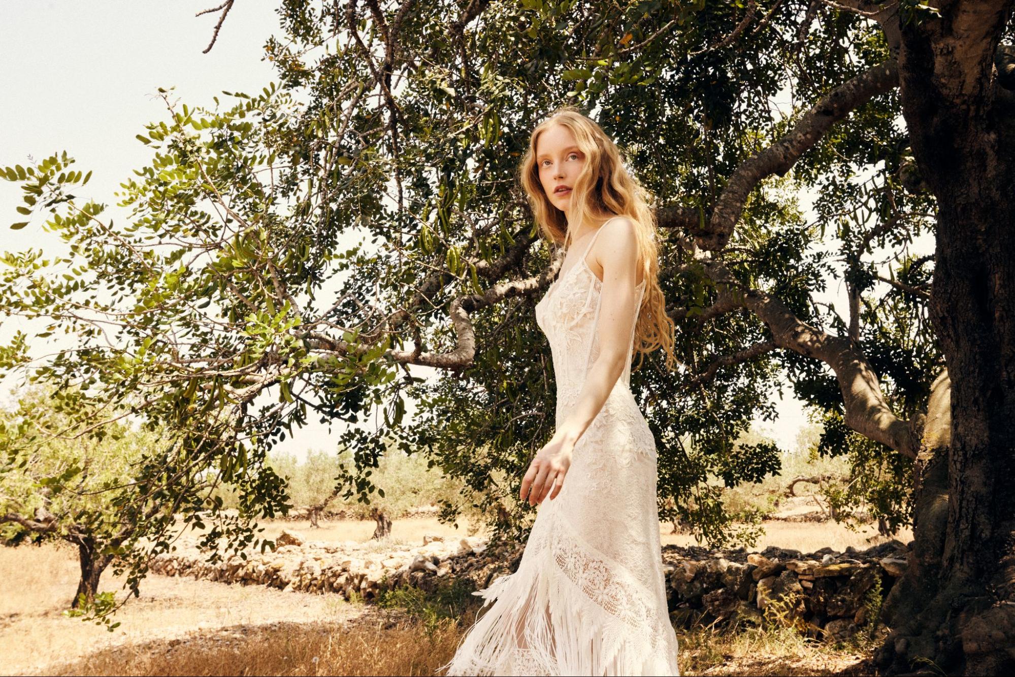 Yolancris Barcelona couture bohemian wedding dress showcased at SAYES Miami bridal boutique