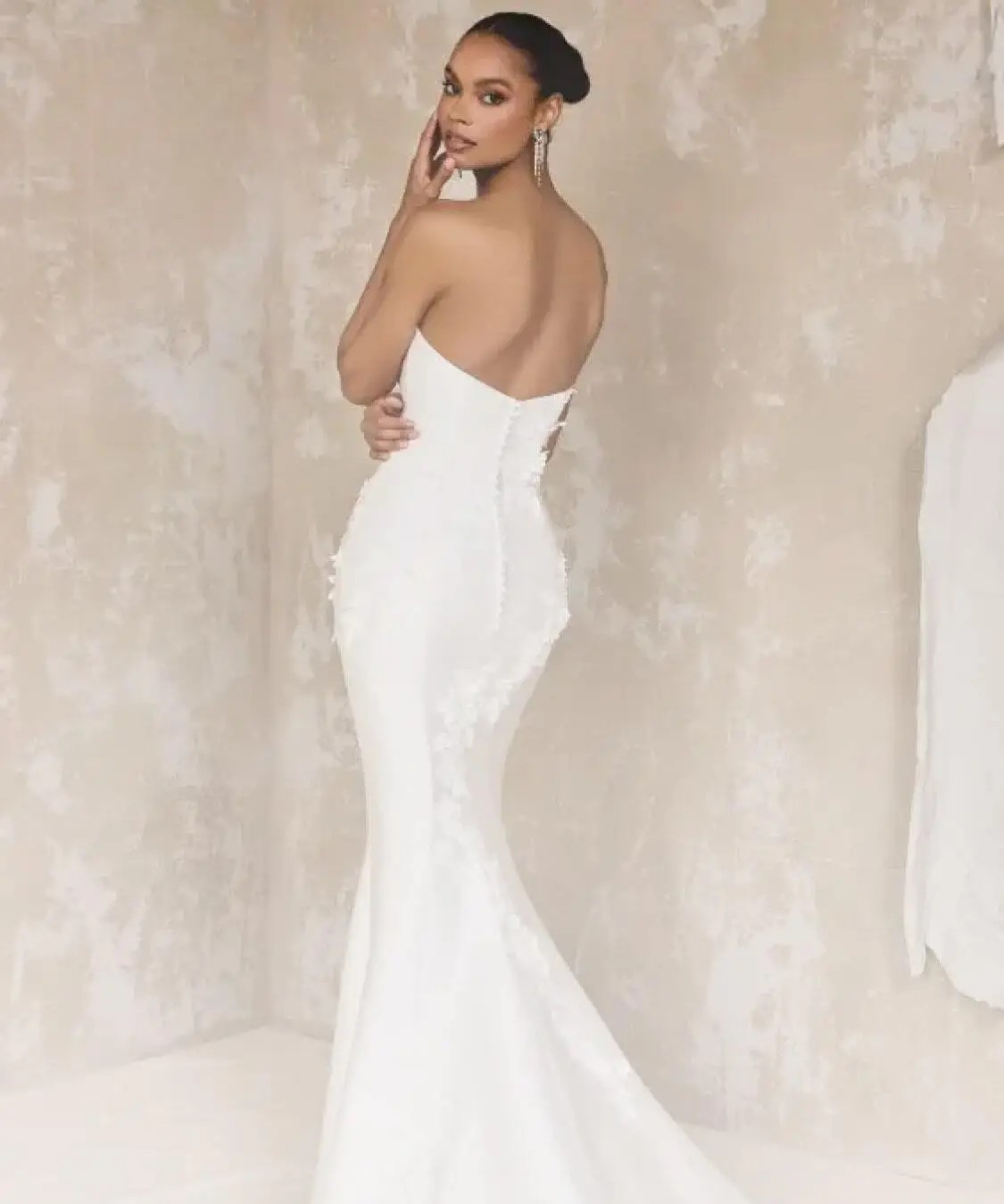 SAYES Miami's Curated Selections from Top Bridal Designers Background